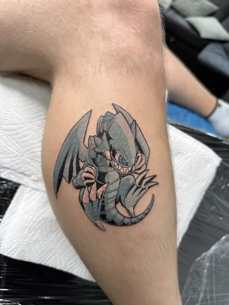 Blue-eyes toon dragon — anime and pop culture tattoo by Lewis Zangaro, The SelfMade Tattoo Company, Wolverhampton