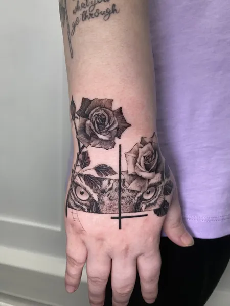 Tiger eyes and roses — black and grey realism tattoo by Lewis Zangaro, The SelfMade Tattoo Company, Wolverhampton