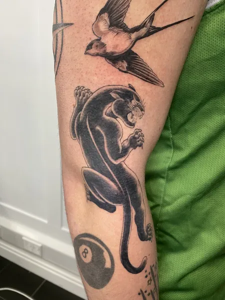 Panther and swallow — black and grey realism tattoo by Lewis Zangaro, The SelfMade Tattoo Company, Wolverhampton