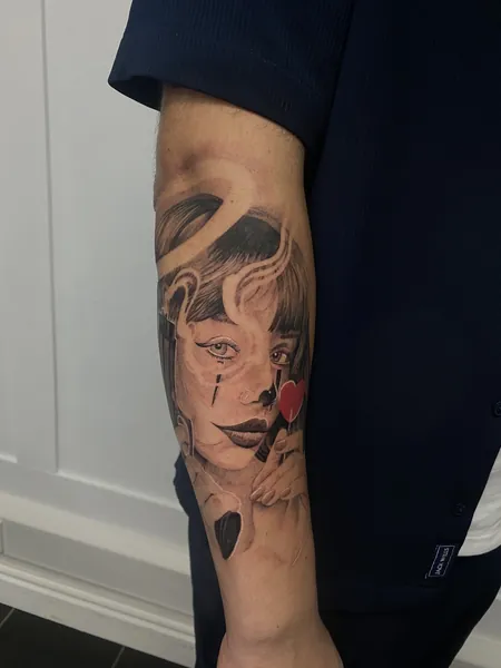Woman with lollipop — black and grey realism tattoo by Lewis Zangaro, The SelfMade Tattoo Company, Wolverhampton
