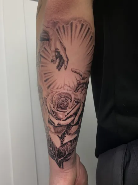 Hands and rose — black and grey realism tattoo by Lewis Zangaro, The SelfMade Tattoo Company, Wolverhampton
