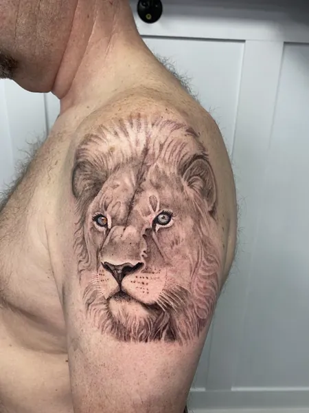 Lion portrait — black and grey realism tattoo by Lewis Zangaro, The SelfMade Tattoo Company, Wolverhampton