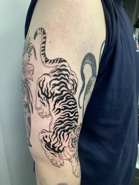 Crawling tiger — black and grey realism tattoo by Lewis Zangaro, The SelfMade Tattoo Company, Wolverhampton