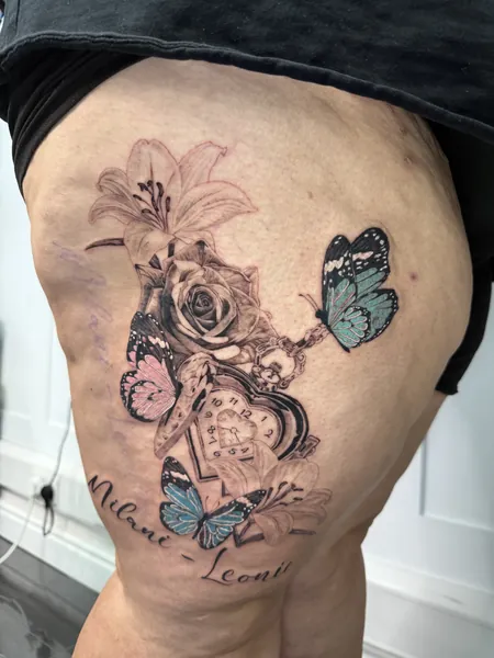 Butterflies, flowers, and clock — black and grey realism tattoo by Lewis Zangaro, The SelfMade Tattoo Company, Wolverhampton