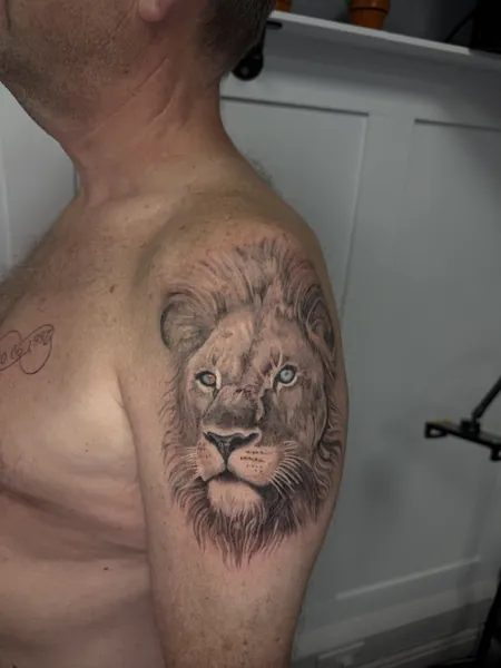 Lion portrait — black and grey realism tattoo by Lewis Zangaro, The SelfMade Tattoo Company, Wolverhampton