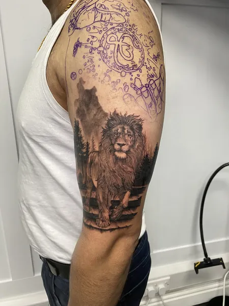 Lion in forest — black and grey realism tattoo by Lewis Zangaro, The SelfMade Tattoo Company, Wolverhampton