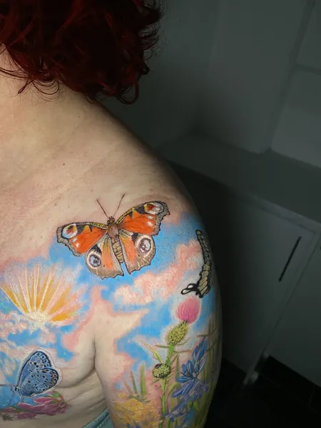Butterflies, sun, and flowers — colour tattoo by Lewis Zangaro, The SelfMade Tattoo Company, Wolverhampton