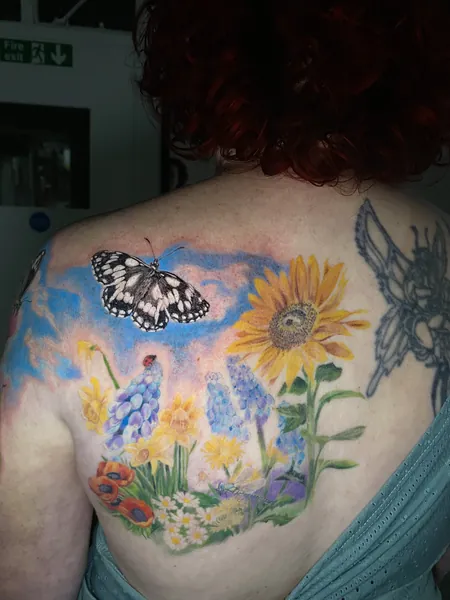 Sunflower and butterfly — colour tattoo by Lewis Zangaro, The SelfMade Tattoo Company, Wolverhampton