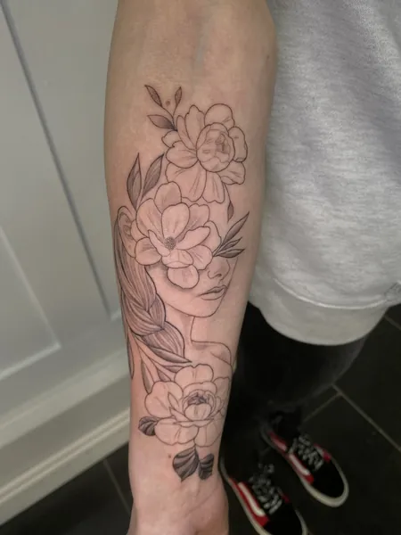 Woman with flowers — fine line tattoo by Lewis Zangaro, The SelfMade Tattoo Company, Wolverhampton
